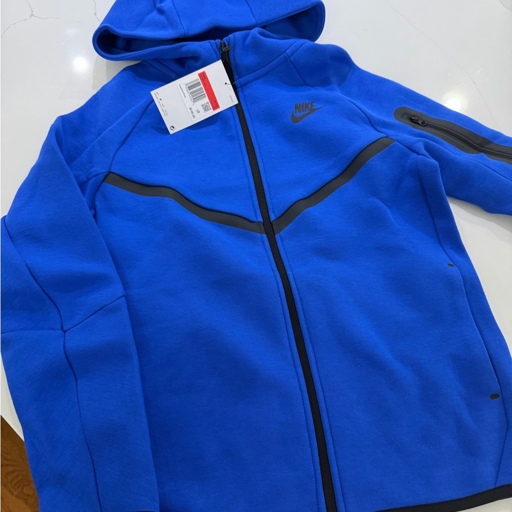 NWT - Nike Tech Jacket and Pants Youth L - Blue. Selling as a set.